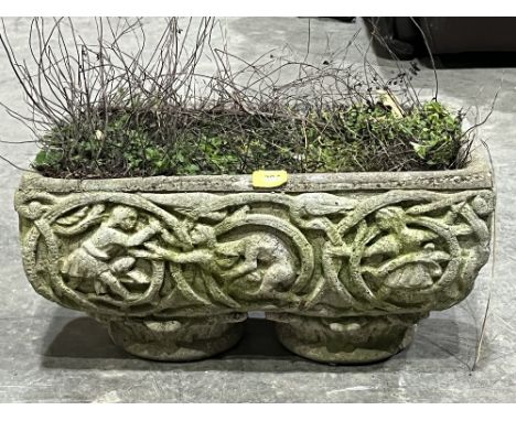 A garden trough with moulded decoration. 21' w x 11' h