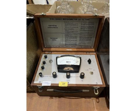 A wide range Megohmmeter; a Bakelite Wattmeter and a Type 02A compass