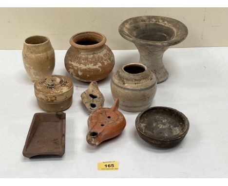 A collection of ancient pottery from Mesopotania, Africa, China and other origins. The lot to include a late Roman Byzantine 