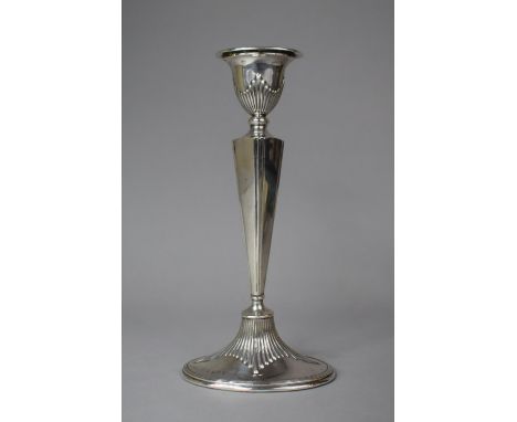 A Silver Candlestick, Birmingham 1913, 23cm high 