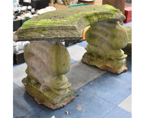 A Reconstituted Stone Garden Bench of Crescent Form on Dolphin Supports, 97cm Wide 