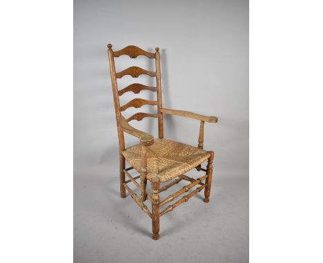 A Late 19th Century Rush Seated Ladder Back Kitchen Armchair 