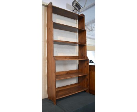 A Large Stained Pine Galleried Six Shelf Open Waterfall Bookcase, 93cm wide 