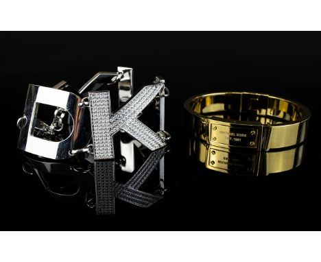 Two Designer Bracelets comprising statement DKNY Bracelet and Michael Kors gold toned  bangle.