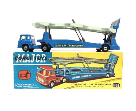 A CORGI NO.1105, BEDFORD TK CARRIMORE CAR TRANSPORTER  with a blue tractor unit and a pale grey and blue trailer, very good c