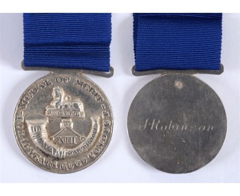 A RARE REGIMENTAL MERIT MEDAL OF THE THIRTEENTH LIGHT INFANTRY TO J. ROBINSON  of solid silver construction, the reverse engr