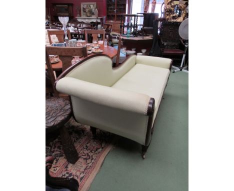 A circa 1820 a Regency mahogany double scroll end sofa on carved and melon fluted tapering legs with brass cup castors and bo