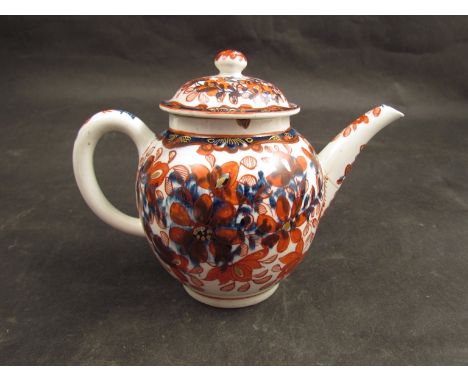 A Lowestoft clobbered pattern bullet shape teapot with cover, spout repaired, 14cm high, including cover 