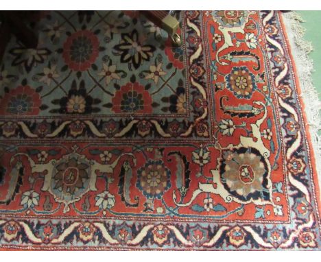 A 19th Century carpet, floral field multiple borders, tasselled ends, 335cm x 220cm