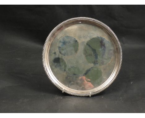 A William Hutton and Sons Ltd silver salver, gadrooned edge raised on three cabriole feet, Sheffield 1936