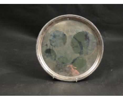 A William Hutton and Sons Ltd silver salver, gadrooned edge raised on three cabriole feet, Sheffield 1936