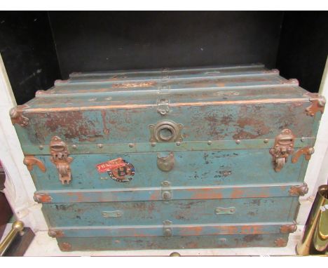 A late Victorian trunk, lathe bound body with labels and script painted green, 60cm x 86cm x 51cm