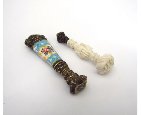 A 19th Century carved ivory seal of two clasped hands and another with Sèvres style body, ornate finial