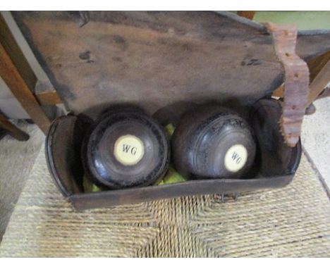A pair of vintage bowls in a case