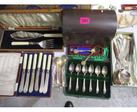 Silver plated and other cutlery and flatware to include commemorative spoons and a Victorian mahogany tea caddy