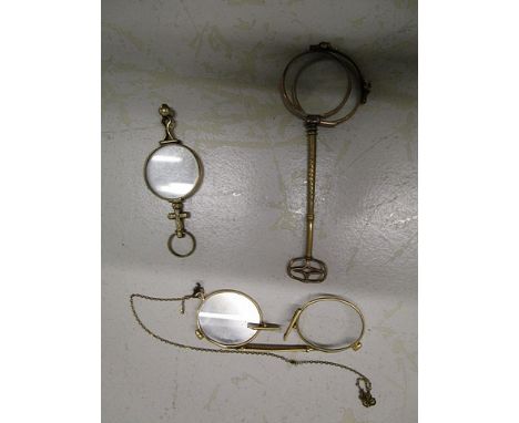 Two gold coloured rimmed 19th century lorgnettes, a pair of gold coloured, rimmed spectacles, a wire cork-screw in sheath, vi