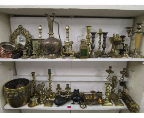 A quantity of Victorian and later brassware and metalware to include candlesticks, wine coasters, dressing table clock and ot