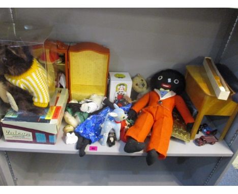 Vintage toys to include a 1970s fabric golly toy, painted plaster Golly band members, a miniature black and white bear, and a