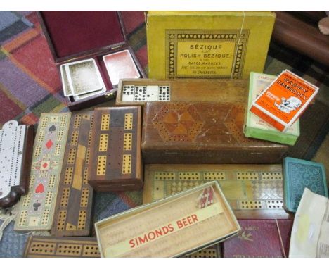 Vintage games to include wooden cribbage boards, playing cards and dominoes