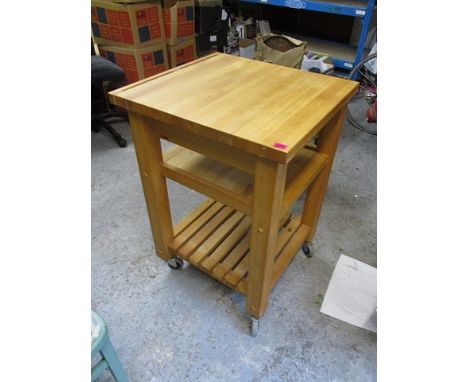 A modern light wood kitchen table, 34 h, 24 3/4 w