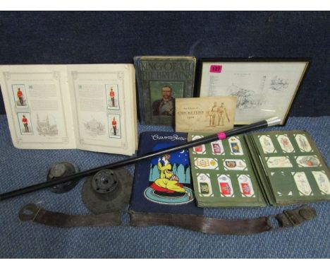 A selection of cigarette cards, a French scouts leather belt and other items including an ebonized and white metal walking st