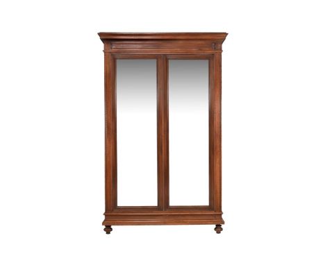 
	
		A French walnut armoire, late 19th century, with mirrored panel doors enclosing a hanging rail, 244cm high, 160cm wide, 