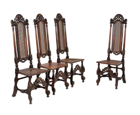 
	
		A set of four walnut and beech highback side chairs in William &amp; Mary style, with cane backs above the seat, on volu