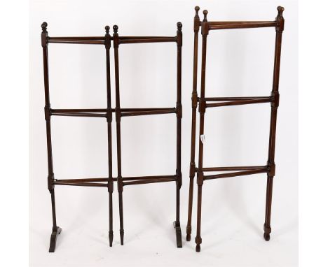 
	
		Two similar folding mahogany towel rails, early 19th century &amp; later, the taller twin rail 102cm high, each panel 35