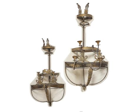 
	
		An unusual pair of ormolu corner sconces, incorporating early 19th century elements, probably previously lustre wall lig