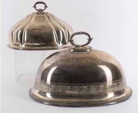 
	
		Two 19th century silver plate meat covers, the smaller with crossed arrow mark for T &amp; J. Creswick, 35.5cm wide, 22c