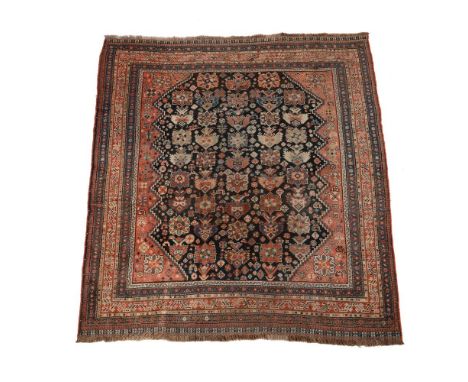 
	
		A Khamseh rug, approximately 183 x 160cm
		
		Condition Report: 
		Slight colour variance across the rug- possibly from 
