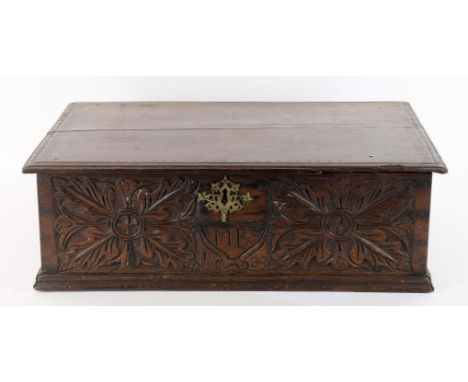 A 17th century and later oak box with carved decoration, bearing inscription and date to the front "MB 1683", 68cm wide, 22cm