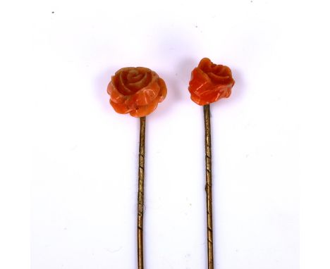 2 Victorian coral rose stick pins, gilt-metal settings, largest head width 11.1mm, 1.9g total (2)A few tiny chips otherwise n