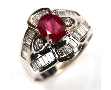 A modern 18ct white gold ruby and diamond cluster ring, in Art Deco style, set with oval mixed-cut ruby and baguette and roun