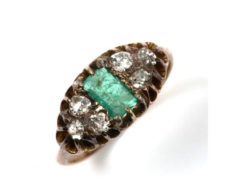 An Antique style emerald and diamond half hoop ring, unmarked yellow metal settings with rectangular step-cut emerald and old