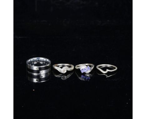Various rings, including 9ct white gold blue stone crossover, 2g, stainless steel and black enamel band etc (4)Lot sold as se