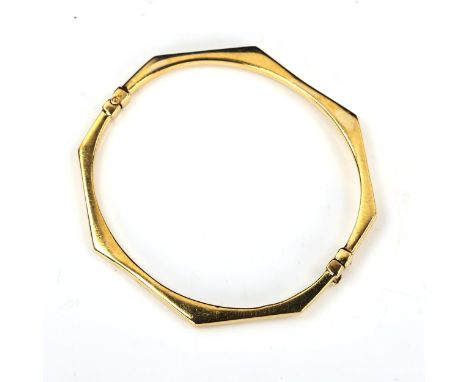 A 9ct gold octagonal hinged bangle, length 65mm, internal dimensions 6cm x 5cm, 7.1gNo damage or repairs, only general surfac