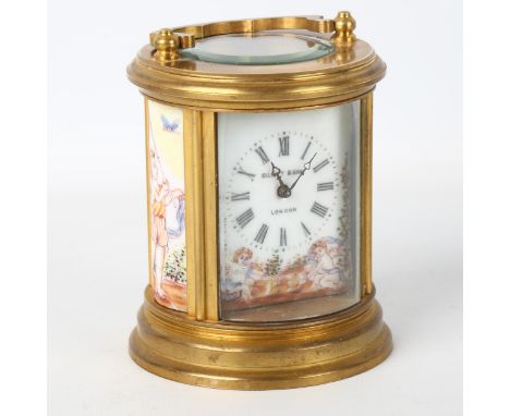 A French miniature brass cased circular carriage clock, handpainted white enemal dial with Roman numerals, porcelain side pla