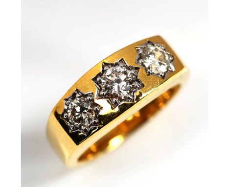 A large modern 9ct gold three stone diamond gypsy ring, set with modern round brilliant-cut diamonds, total diamond content a