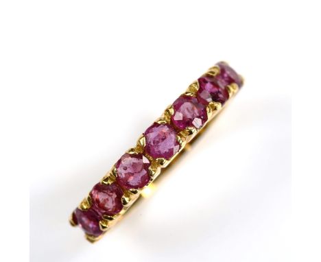 A Continental 18ct gold seven stone ruby half eternity ring, setting height 3.4mm, size I, 2.8gNo damage, all stones present 