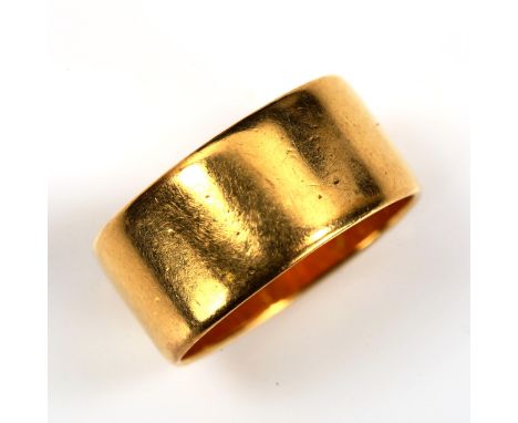 A mid-20th century 22ct gold wedding band ring, maker's marks WW Ltd, hallmarks London 1956, band width 8.7mm, size L, 6.6gNo