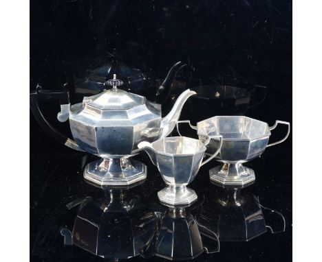 A George VI Art Deco silver 3-piece tea set, comprising teapot, 2-handled sugar bowl and cream jug, octagonal pedestal form w