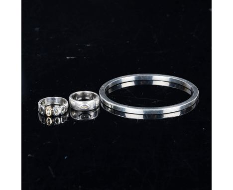 Various Danish sterling silver jewellery, comprising slave bangle and 2 rings, bangle internal measurements 6.5cm x 5.5cm, ri