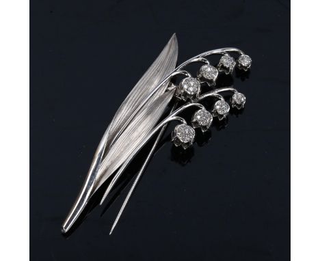 A late 20th century Continental 18ct white gold diamond Lily of the Valley floral spray scarf clip brooch, set with single-cu