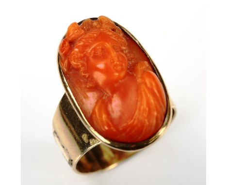 A large Antique coral cameo panel, in modern 9ct gold ring mount, hallmarks London 1974, setting height 24.8mm, size S, 8.3g 