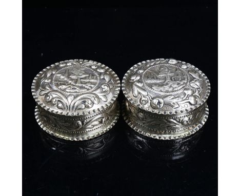 A pair of Antique Continental silver toilet boxes and covers, circa 1890, possibly Scandinavian, relief embossed foliate deco