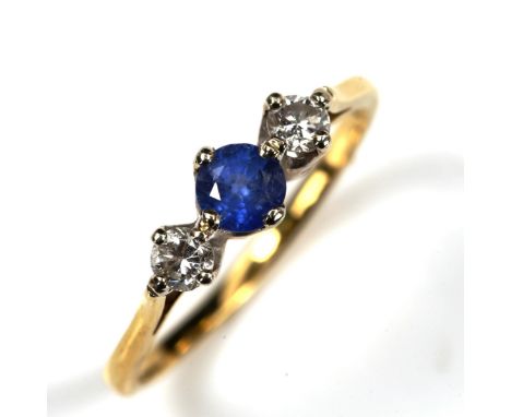 An 18ct gold three stone sapphire and diamond ring, set with round-cut stones, total diamond content approx 0.2ct, size Q, 2.