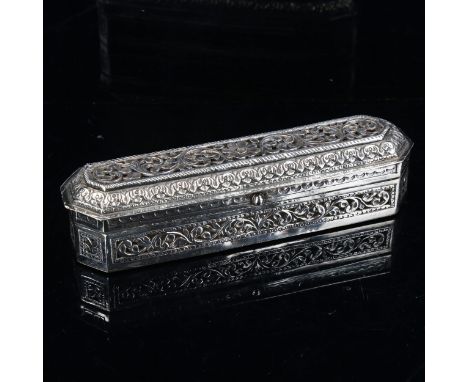 An Indian silver pen box, elongated hexagonal form with pierced and relief embossed floral decoration, length 18cm, 7.6ozNo d