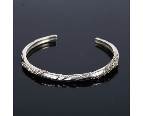 GEORG JENSEN - a Vintage Danish stylised sterling silver Viking Revival torque bangle, designed by Ole Kortzau, model no. 384