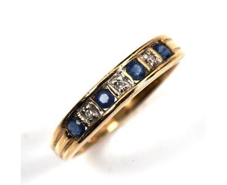 A modern 9ct gold seven stone sapphire and diamond half hoop ring, setting height 4.2mm, size O, 2.2gNo damage or repairs, al